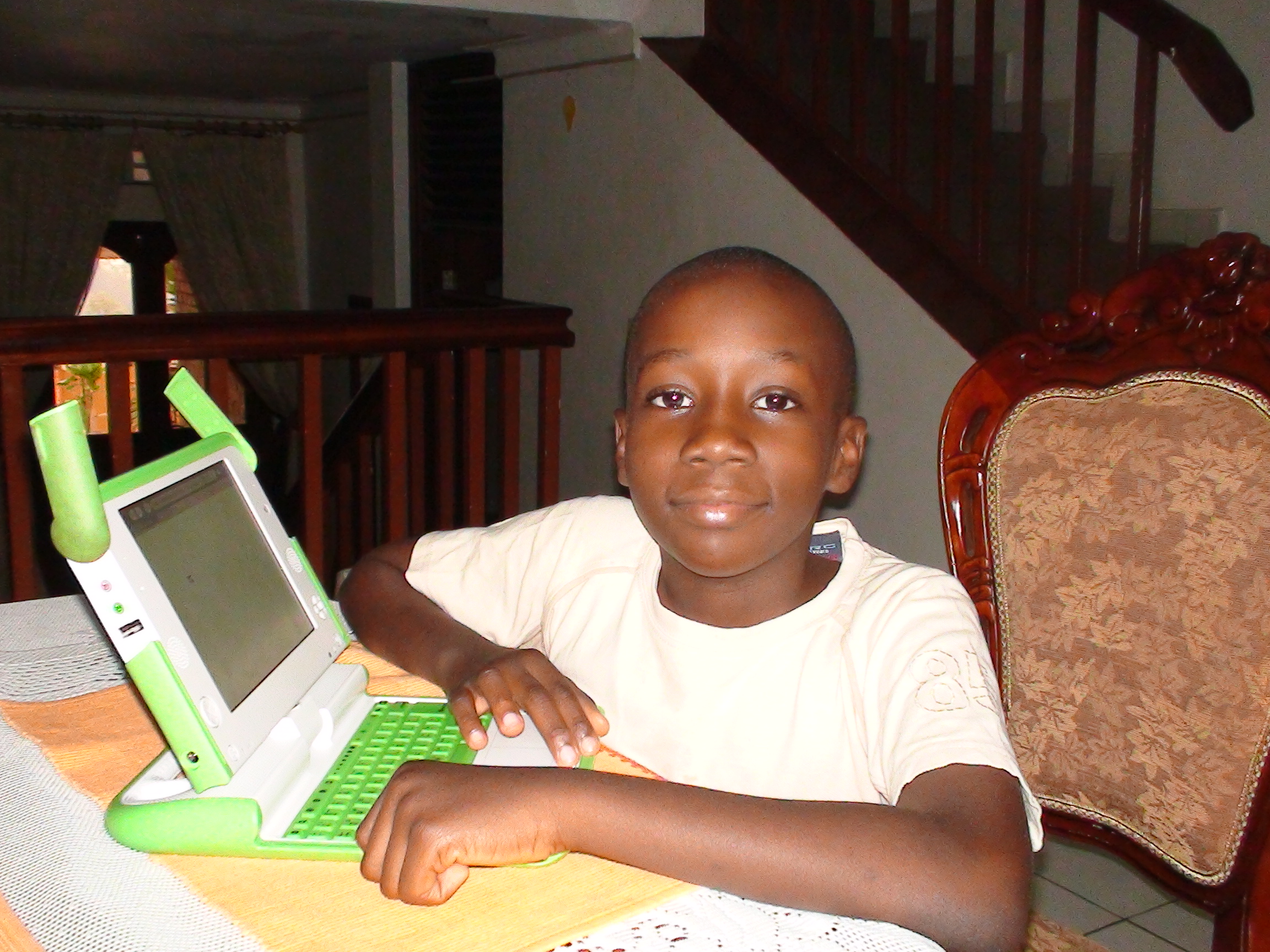 Collin Kabagambe with his laptop